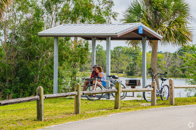 Taking a bike ride break in tranquil Okeeheelee Park, a hidden gem in the heart of Ranchette.