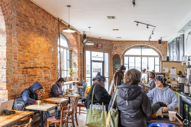 Neighbors feel at home at The Daily Press coffee shop.