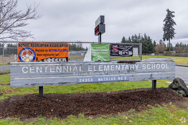 Signage at the entrance to Centennial Elementary School.