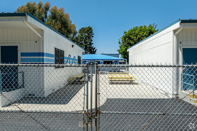 Picnic tables in between some classrooms at Harry Wirtz Elementary School in Paramount.