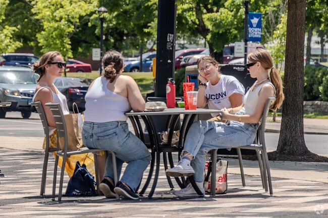 Just minutes from Ashford, downtown Mansfield offers a charming setting perfect for relaxing with friends.