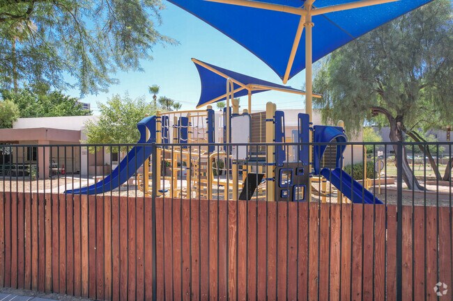 Students have access to a shadd playground at Khalsa Montessori in central Phoenix .