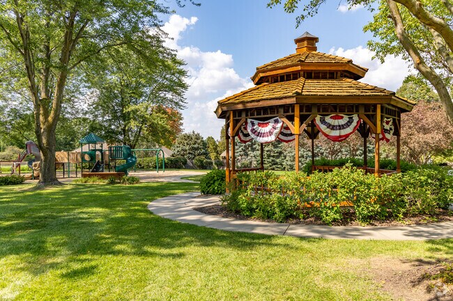 Private Linden Park offers green space, sidewalks, and a gazebo for residents.