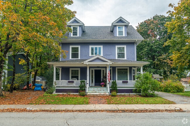 Single family homes with large front porches are common in Uxbridge.