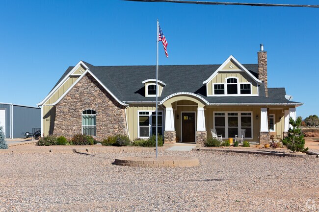 Two-story homes in Parowan offer large yards and classic architectural details.