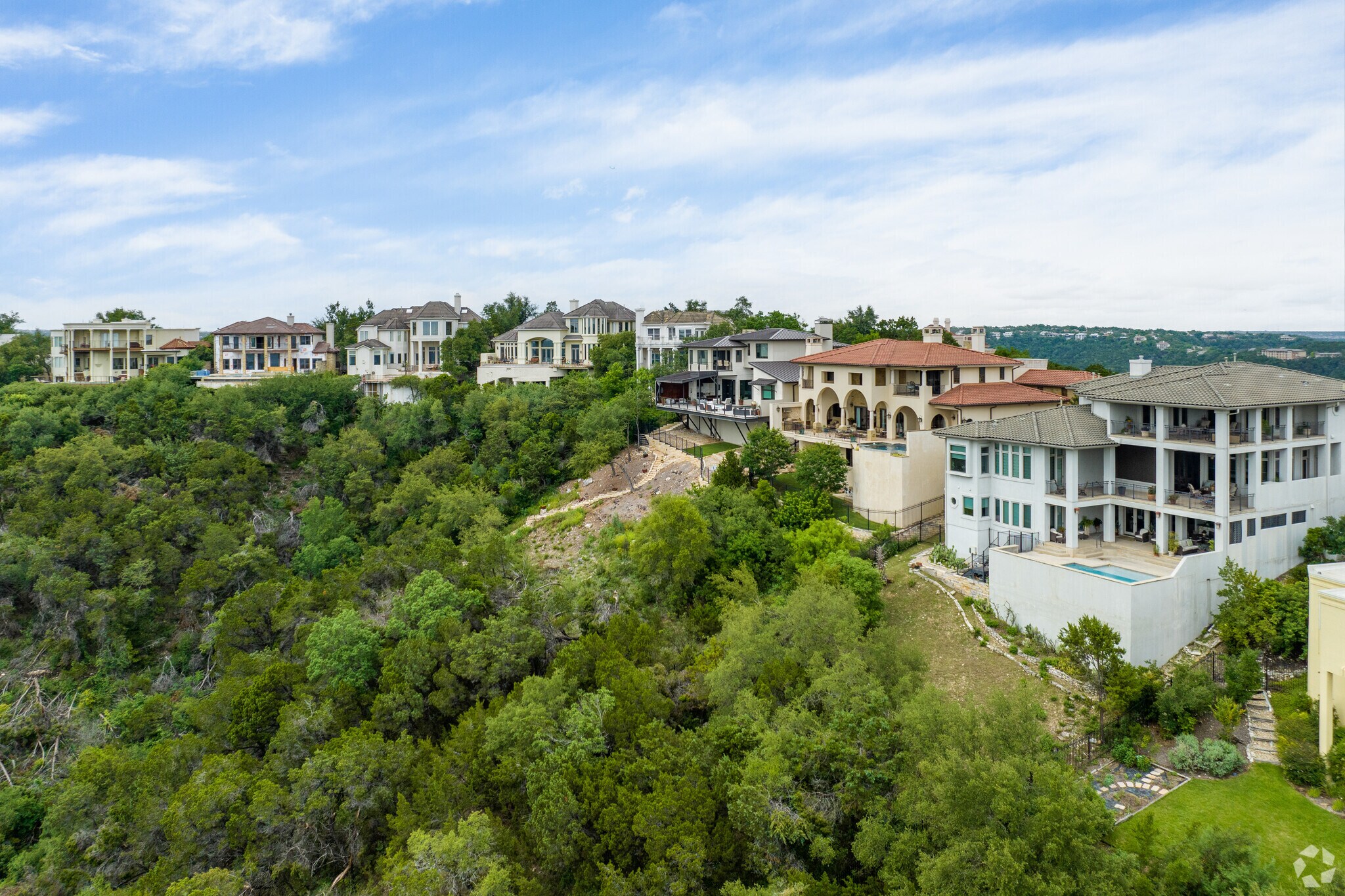 Luxury homes with stunning mountain vista views overlooking the Hill Country.