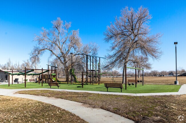 Magna residents enjoy a playground and baseball fields at Magna Copper Park.