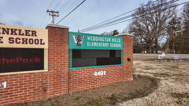 There are 3 different schools on the campus of Weddington Hills Elementary School.