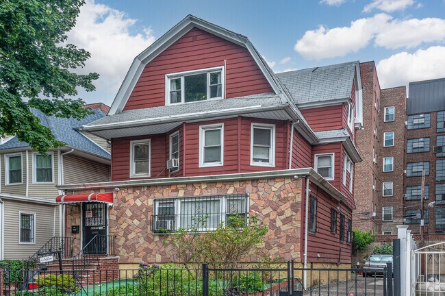 Many houses in Elmhurst have large driveways to fit two cars.
