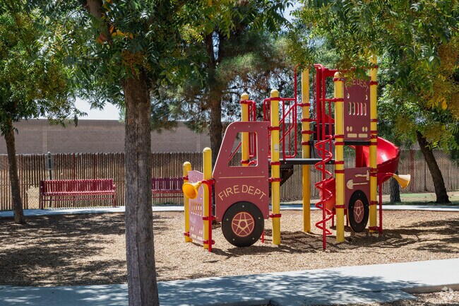 Kids love to play on the fire truck play set at Mondavi Park in Bakersfield.