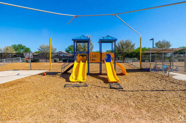 Slide your way into fun on the playground of Sunrise Preschool in Maricopa, Arizona.
