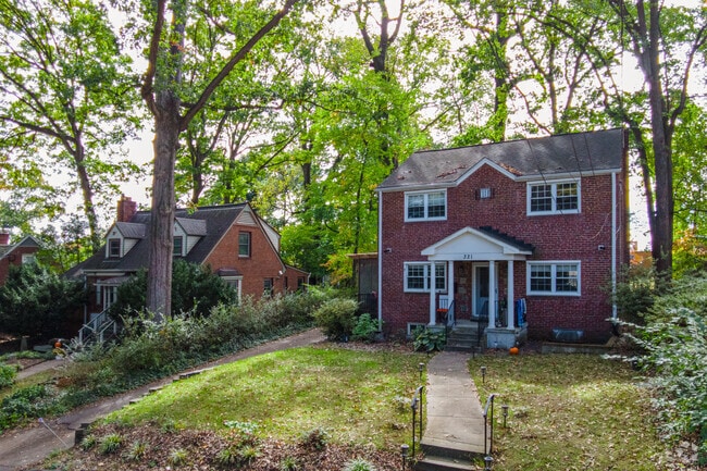 Brick Colonial homes grace tree-lined streets in Silver Spring Park.