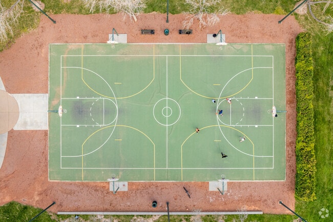 Arbors Play Park offers basketball, walking trails and more near Queensridge.