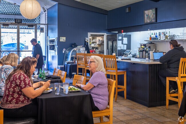 Enjoy art and conversation over a meal at Café des Artistes in Fallbrook.