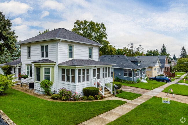 Four square homes in various styles sit in a row on Antioch's neighborhood streets.