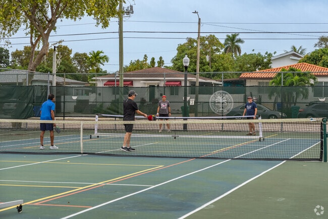 Tennis courts are available for a game in Southeast Gables.