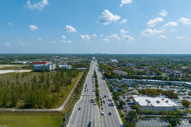 Kendall Drive runs alongside Kenland, connecting residents to nearby shops, parks, and the heart of Miami.