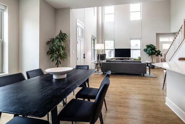 Signature Collection Townhome dining and living room area with hard surface flooring