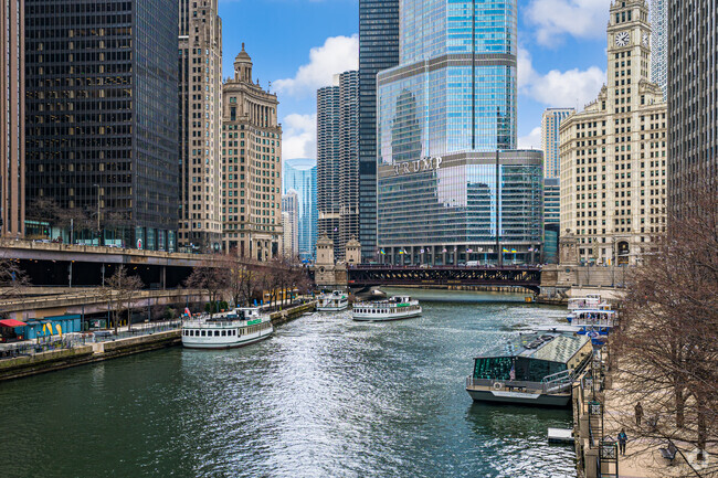 Boats on the Chicago River are always going by the New East Side.