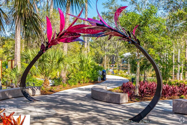 Stunning flower based sculptures fill Florida Botanical Gardens.