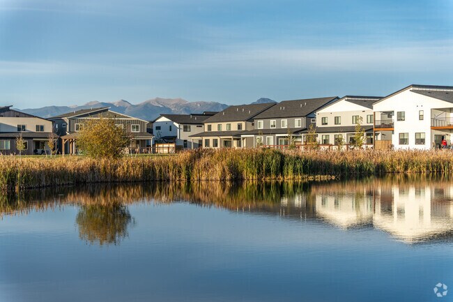 Modern homes and mountain views define the peaceful community of Flanders Creek in Bozeman.