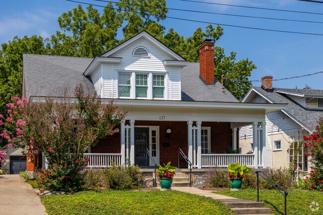 Some homes are elevated from the street and have large front porches in Aylesford Place.