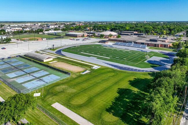 View of North High School showing all the activities to participate on the sports field.