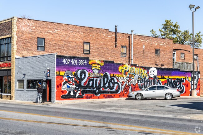 There are many colorful murals for businesses in Monmouth Park.