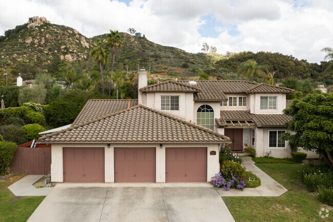 Mediterranean-style homes in Daley Ranch have garages and backyard pools.