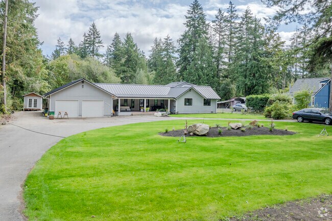 Inland homes on Erlands Point range from cape cod to ranch style.