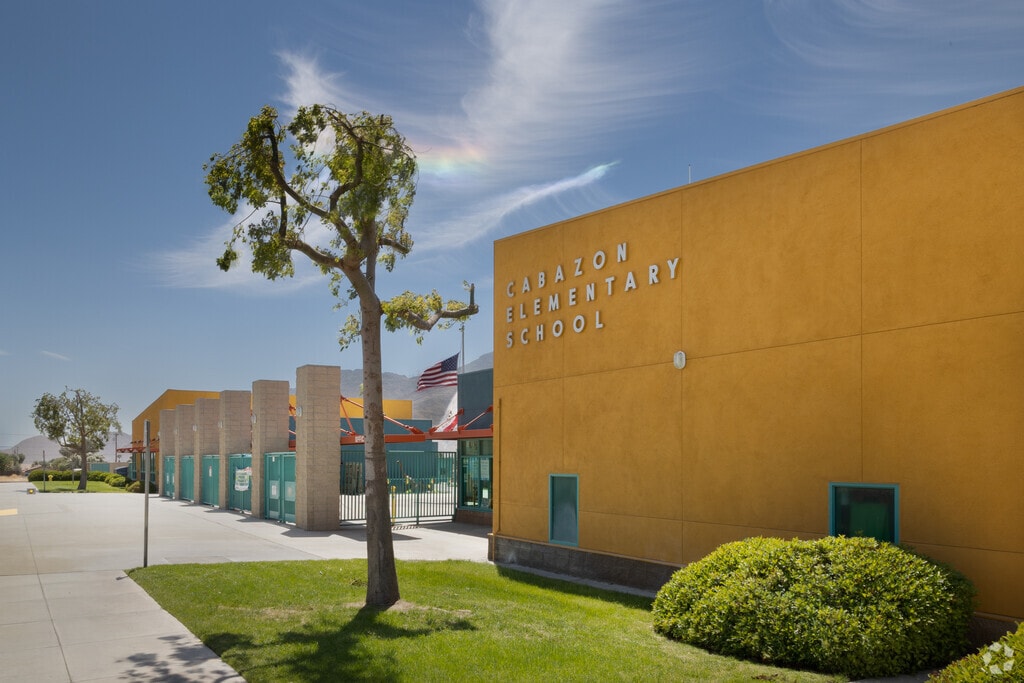Blue skies over the orange exterior of Cabazon Elementary School.