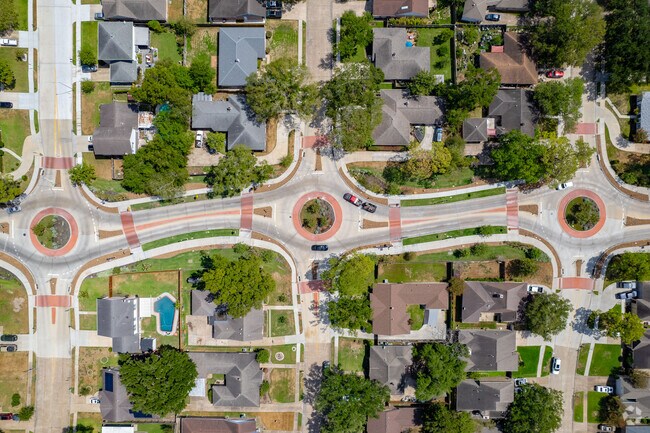 Well-maintained streets weave through Meadows Place.