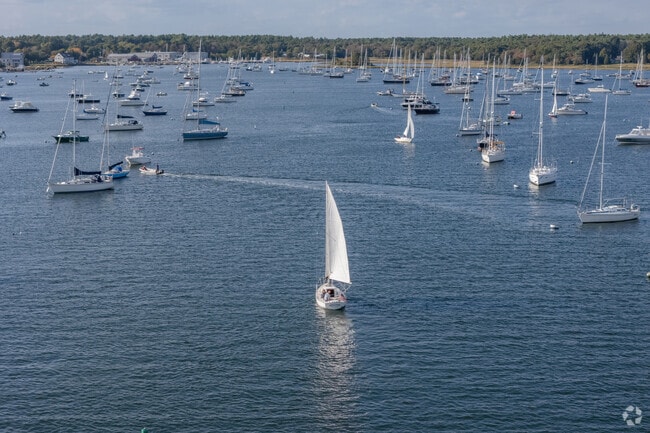 Heading homeward, a sail boat navigates the channel at the Marion Center neighborhood.