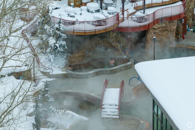 Admission fees vary to soak in the eight natural hot springs and to explore the surrounding recreation center, which includes waterslides, a climbing wall, an indoor gym and a café.