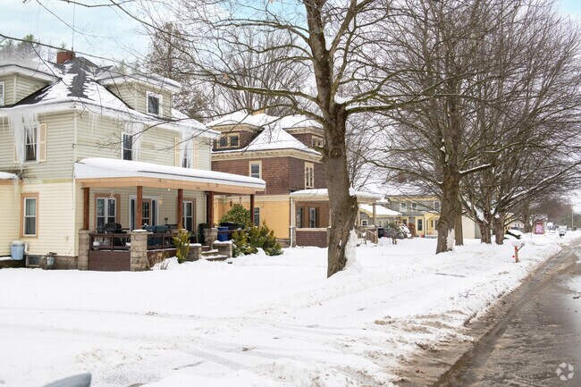 A cluster of American Four-Square–style homes adds charm and character to the Kiantone neighborhood.