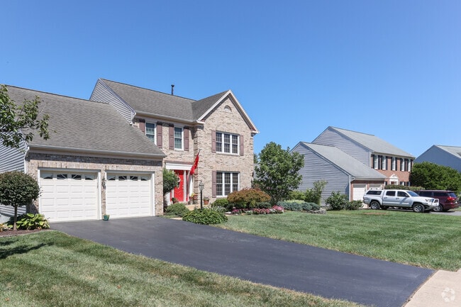 Kingsbrooke homes feature lush landscaping that boost curb appeal.