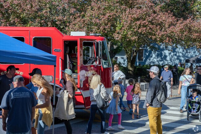 Municipal departments are represented with trucks at Newport's Broadway Street Fair.