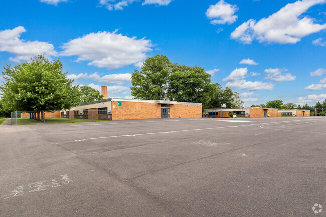 Play area with basketball courts at Hoover Elementary School in Hulmeville.