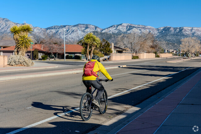A bicyclist makes the difficult journey up the steep hills of the John B Robert area.