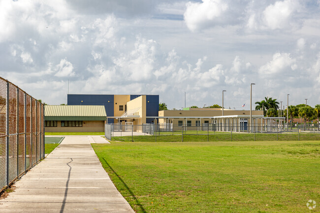 Golden Gate Middle School in Naples features recreation areas at the rear of the building.
