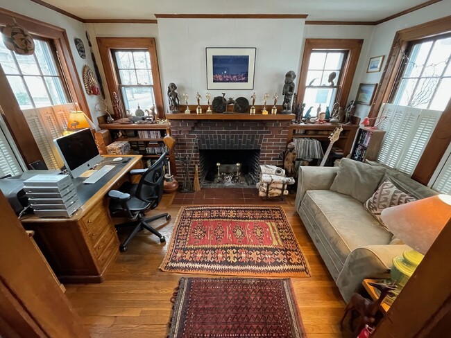 Den with Desk, Fireplace & Couch