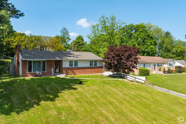 Ranch homes in Newtown Square sit on large lots in quiet residential areas.