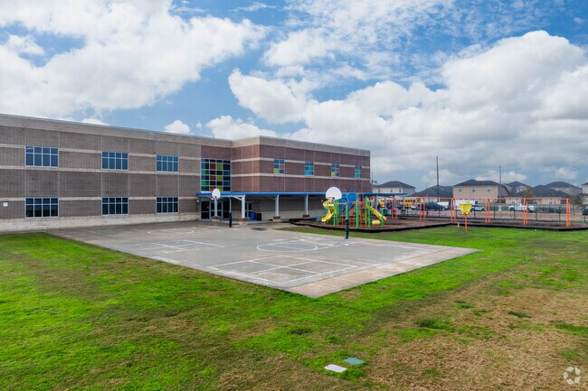 Bel Nafegar Sanchez Elementary offers a paved basketball court.