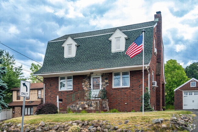 A Cape Cod-style home in Haledon offers classic design and cozy charm.