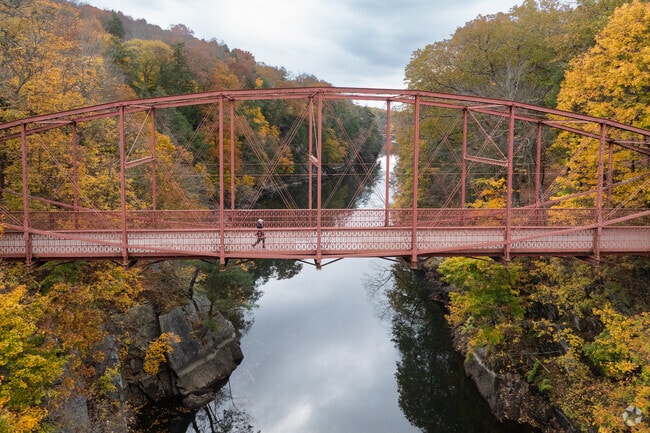Lovers Leap State Park’s iron bridge offers historic charm and river gorge views.