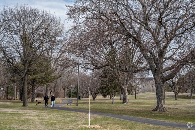 Brooklyn Center residents enjoy taking a walk at Centennial Park.