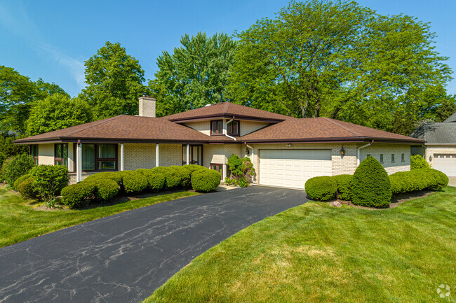 Homes in Brook Forest sit on spacious lots  such as this split-level home style.