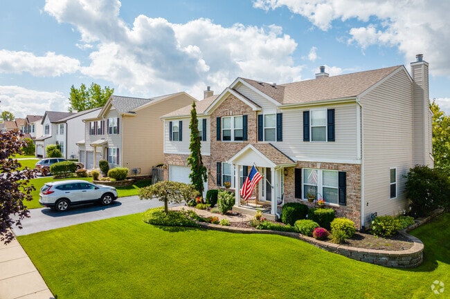 Homes in Tiffany Farm feature brick landscaping and pristine yards.