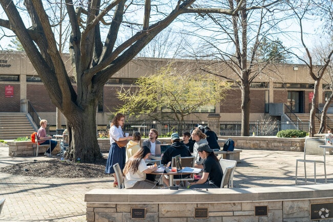 Students discuss business ideas at North Central College in Naperville's Historic District.