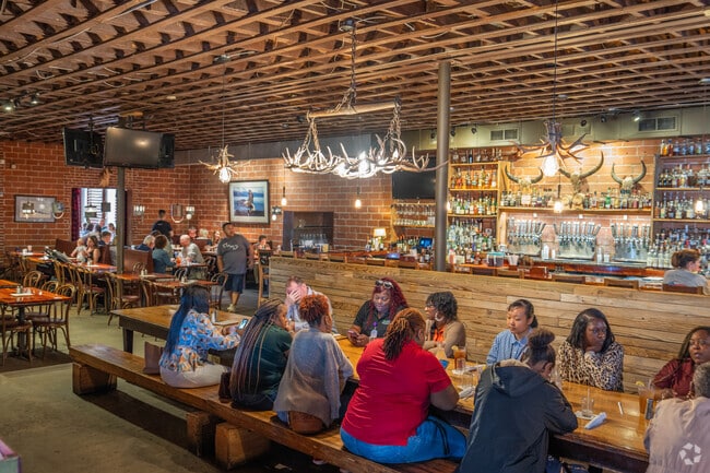 Seating at The Hound included booths, benches, tables, and a hightop bar.